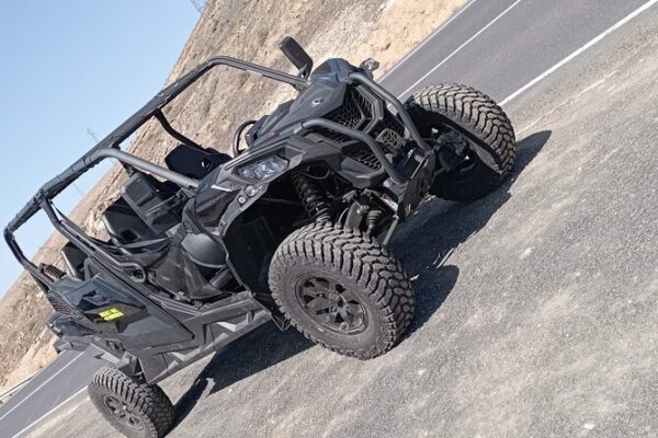 A black dune buggy on the street of Lanzarote